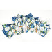 Four fanned out cloth napkins colored in blue, white, and green fabrics from the Blue Harmony collection, isolated on a white background. 