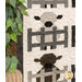 A stylized close up of the quilt, showing details on two of the sheep blocks as coordinating greenery peeks into frame from the left side.
