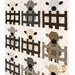 An angled shot of the center of the quilt, showing the various iterations of the patchwork lambs. 