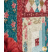 A stylized close up on the quilt, taken at a slight angle with coordinating flowers peeking into frame from the left side.