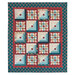 The completed Patchwork Porch quilt in ocean blue, brick red, and sandy cream fabrics from the Lighthouse collection by Andover Fabrics, isolated on a white background.