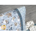 A close up on the pillowcase showing details on the prints and coordinating decor.