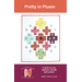 The front of the Pretty in Pluses Quilt Pattern, showing the finished quilt isolated on a white background.