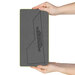 A model holds up the GO! Towel Topper Die with two hands, demonstrating scale.