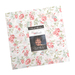 A square bundle of floral fabric featuring pink and green flowers, labeled Moda Fabrics.
