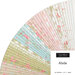 A fan of fabric strips in pastel colors and floral patterns with a label reading Abide.