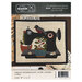 Front of the pattern showing the completed project, a sewing machine with potted plants and robin.