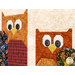 A super close up on the two owls, showcasing fabric, stitching, and embellishment details.