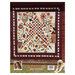 The back of the Stellar Garden quilt pattern book showing a large image of the main finished quilt. The quilt features a large patchwork star with fall colors and appliqué designs surrounding it. 