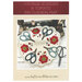 Front cover of pattern, showing the completed project on a sewing table.