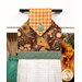 A close up on the top section of the towel, showing details on the floral fabric as well as the fabric button.