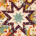 A super close up on the center of the hot pad, demonstrating fabric details on the beautiful folded star center.