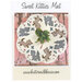 Front cover of pattern, showing the completed project on a paint faded wood background.