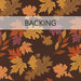 A swatch of brown fabric with acorns and gold, brown, and purple leaves blowing past. A banner at the top reads 