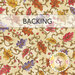 A swatch of cream fabric with gold, red, and purple falling leaves. A banner at the top reads 