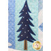 A super close up on an appliqué pine tree demonstrating fabric colors and machine embroidered details.