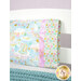 A closer look at the pillowcase, demonstrating color and print details on the fabric.