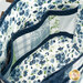 A shot of the interior of the tote bag, showcasing the fabrics and the organized inside pockets.