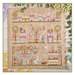 A image of the completed Easter in the city cross stitch pattern staged with eucalyptus greenery.  