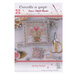 Front of pattern showing a picture of the completed project staged with baby's breath and scissors.