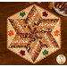 A top down shot of the table topper, demonstrating color and patchwork details.