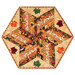 The completed 60 Degree Diamond Table Topper colored in warm fall fabrics from the Autumn Fields collection by Studio E Fabrics, isolated on a white background.