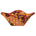 The completed bowl cozy colored in warm autumn themed fabrics from the Autumn Fields collection by Studio E Fabrics, isolated on a white background.