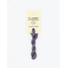 A skein of variegated purple and muted purple embroidery floss, twisted and bundled, with a cream and black label featuring the brand name and color information.