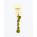 A skein of muted green embroidery floss, twisted and bundled, with a cream and black label featuring the brand name and color information.