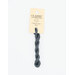 A skein of blue gray embroidery floss, twisted and bundled, with a cream and black label featuring the brand name and color information.