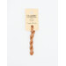 A skein of light copper embroidery floss, twisted and bundled, with a cream and black label featuring the brand name and color information.