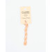 A skein of light peach embroidery floss, twisted and bundled, with a cream and black label featuring the brand name and color information.
