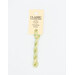 A skein of variegated light yellow and light green embroidery floss, twisted and bundled, with a cream and black label featuring the brand name and color information.