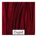 A variegated swatch of Classic Colorworks floss in the colors red and dark red. 