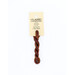 A skein of dark brown embroidery floss, twisted and bundled, with a cream and black label featuring the brand name and color information.