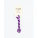 A skein of purple embroidery floss, twisted and bundled, with a cream and black label featuring the brand name and color information.