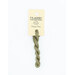 A skein of light green embroidery floss, twisted and bundled, with a cream and black label featuring the brand name and color information.