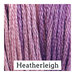 A variegated swatch of Classic Colorworks floss in the colors pink and purple.