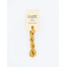 A skein of golden yellow embroidery floss, twisted and bundled, with a cream and black label featuring the brand name and color information.