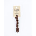 A skein of variegated brown embroidery floss, twisted and bundled, with a cream and black label featuring the brand name and color information.