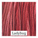 A variegated swatch of Classic Colorworks floss in the colors pink and red.