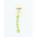 A skein of light green embroidery floss, twisted and bundled, with a cream and black label featuring the brand name and color information.