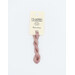 A skein of light purple embroidery floss, twisted and bundled, with a cream and black label featuring the brand name and color information.