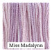 A variegated swatch of Classic Colorworks floss in the colors pink and purple.