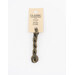 A skein of muted sage green embroidery floss, twisted and bundled, with a cream and black label featuring the brand name and color information.