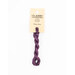 A skein of purple embroidery floss, twisted and bundled, with a cream and black label featuring the brand name and color information.