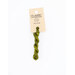 A skein of green embroidery floss, twisted and bundled, with a cream and black label featuring the brand name and color information.