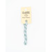 A skein of light blue embroidery floss, twisted and bundled, with a cream and black label featuring the brand name and color information.