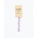 A skein of variegated pastel pink and purple embroidery floss, twisted and bundled, with a cream and black label featuring the brand name and color information.