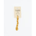 A skein of honey yellow embroidery floss, twisted and bundled, with a cream and black label featuring the brand name and color information.